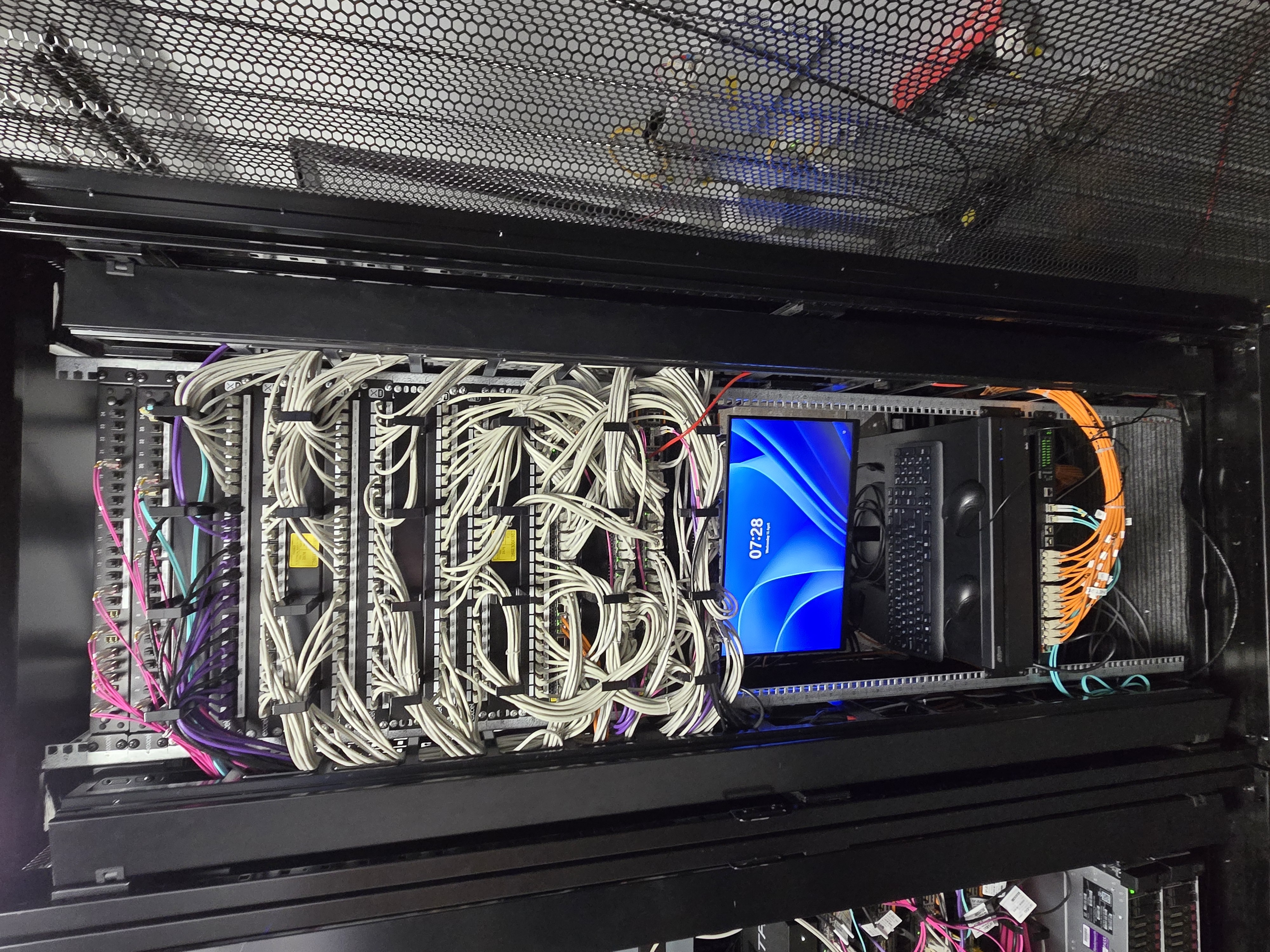 Fully populated server rack — live commissioned infrastructure